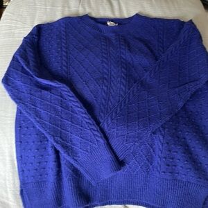 And Taylor purple sweater. Size large.
